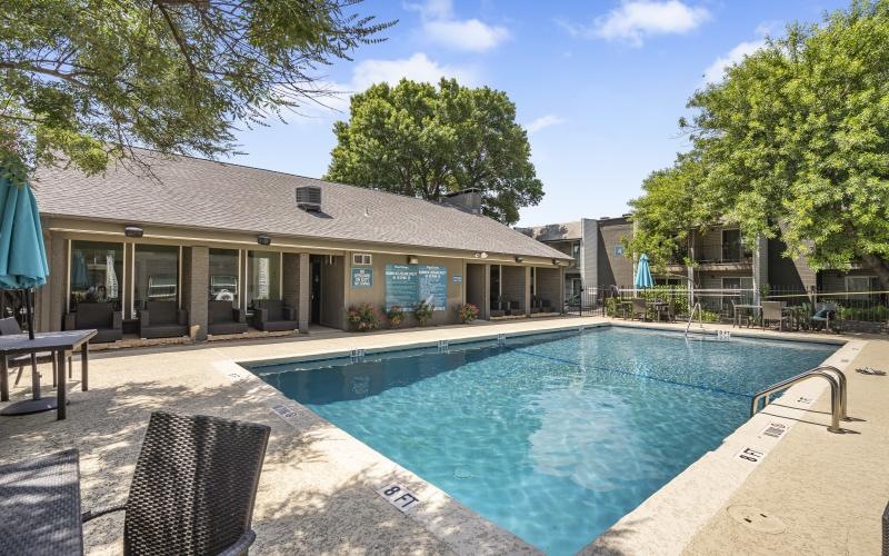 a swimming pool outside a house