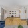 a living room with a wood floor