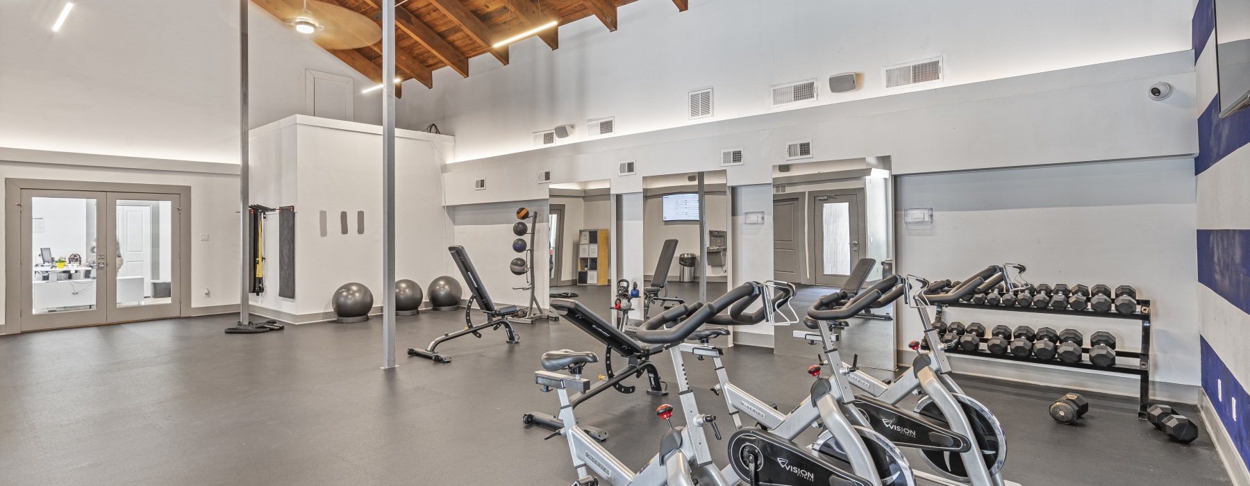 fitness center with cardio machines