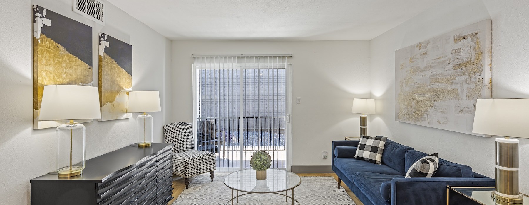 a living room with a couch and a table