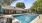 a swimming pool outside a house