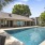 a swimming pool outside a house