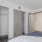 a room with a bed and doors