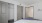a room with a bed and doors