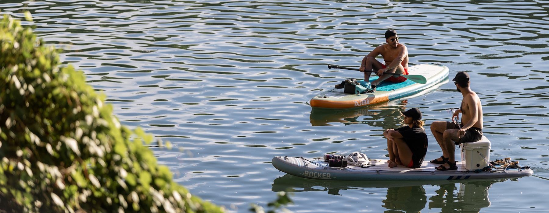 a group of men on canoes