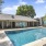 a swimming pool outside a house
